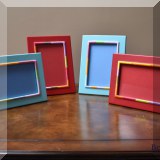 D29. 4 Sky blue and red picture frames.